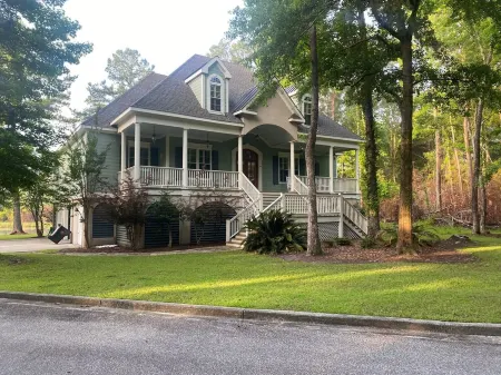 Beautiful Custom Home Overlooking Pond