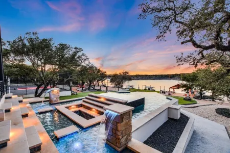 Lake Front Home with Pool, Dock, Views, Sports Court, & Beautiful Sunsets!