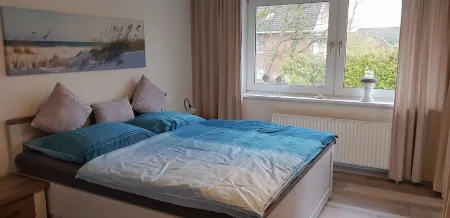 Vacation bungalow with a garden property only 3 minutes away from the beach Отели рядом с достопримечательностью «Scharbeutzer Strand Ostsee»