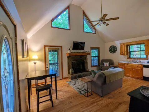 Cozy cabin with wrap around porch and only minutes to town!