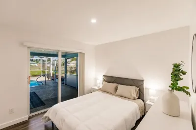 Completely Remodeled 3 Bedroom Home With A Pool Hotels near Publix Super Market at Coral Pointe Shopping Center