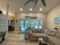 Tropical Escape- Heated Pool, Peloton, Pet Friendly 3 Bedroom/2 Full Bathrooms