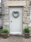 Cosy contemporary  cottage in village with own courtyard & original features.
