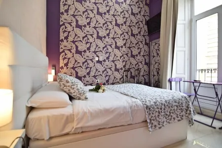 Apartamentos Marques de La Merced Отели рядом с достопримечательностью «Estación de Autobuses de Málaga»