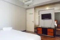 Vibrant and Luxurious 2Br Apartment at Trillium Residence Surabaya - Kitchens