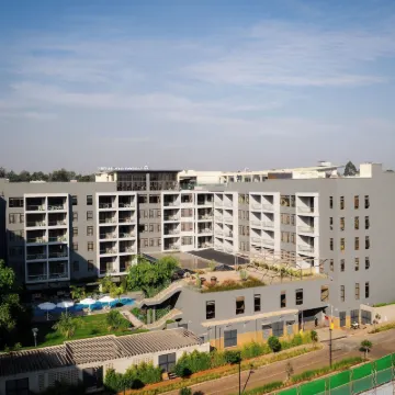 Trademark Suites at Enaki Town Hotels near Village Market