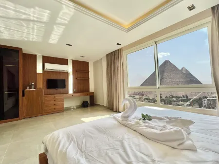 Alpha Pyramids Hotel Отели в г. Kafr Nassar