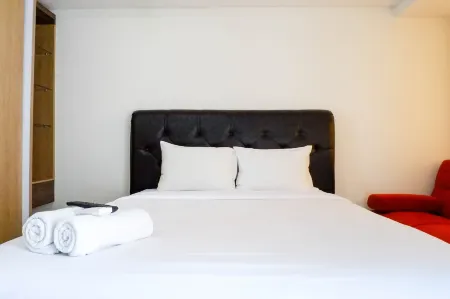 Serene Exclusive Modern Studio Apartment at Grand Sungkono Lagoon Отели рядом с достопримечательностью «Loop»