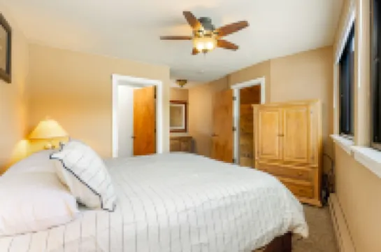 Mountain and River Views with Cozy Living Area - Charming Alpine Retreat