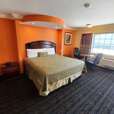 Delmonico Inn & Suites Hotels near Mission San Fernando Rey de España