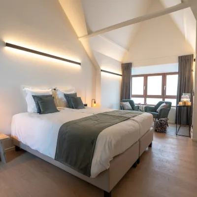 Guesthouse de la Paix โรงแรมใกล้อาคารอิเพอร์คลอธฮอลล์