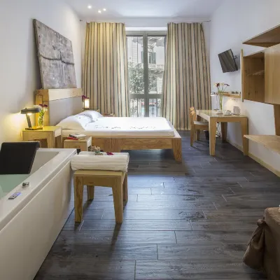 Aquarooms Luxury Suites Отели рядом с достопримечательностью «Улица Виа-Макуэда»
