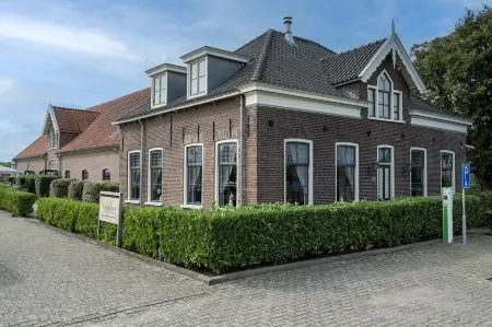 Hotel - restaurant Hoeve Kromwijk Отели в г. Зутермер
