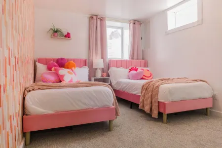 Colorful & Fun 4 Bdrm, 6 Beds, 2 Baths, Hot Tub & Outdoor Living in Rapid City!