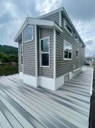 Waterfront Glamping Escape — Cozy Floating Cottages on the Peaceful Beaver River