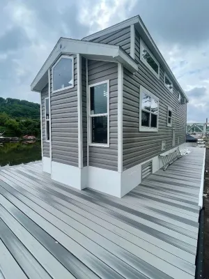 Waterfront Glamping Escape — Cozy Floating Cottages on the Peaceful Beaver River Hotels near The Belvedere at Beaver Station