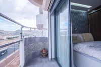 Cozy retreat,just a 5-minute walk from the beach. offers a comfortable&relaxing Отели в г. 