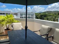 Poolside Penthouse on Natural Caribbean Beach