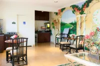 The Symphony Inn & Suites Hotels in Meadows Place