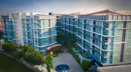 Wisdom Hotel & Residence Отели рядом с достопримечательностью «Wat Map Ta Phut»