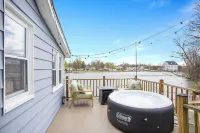 Beautiful boathouse with an all season hot tub, paddle boat and kayaks!