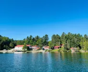 Rustic Log Cabin #8 on Crow Lake at Bull Moose Lodge. Family and pet friendly