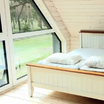 Gemütliches Holzhaus mit Garten nah am Wasser, Hundefreundlich Отели в г. Полицкий повят