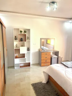 Résidence Atlantis bedroom kitchen toilet living room with balcony sea view Hotels near Zam Zam 1