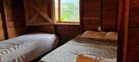 Cozy cabaña overlooking a beautiful valley. Finca Fajardo Lodge. Rustic Cabin#1