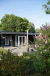 Luxe en Ruim Chalet met Airco aan het Leekstermeer. Huisdiervriendelijk Hotel a Noordenveld