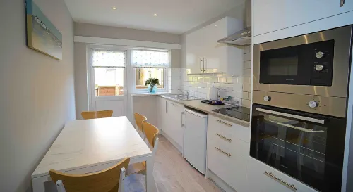 Twelve Apartments - Kitchens