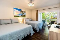 Boutique Condo with Contemporary Art: Steps from Scenic Poipu Beach Trail.