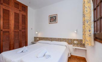 Apartamentos Son Bou Gardens by Menorcarentals - Housity