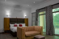 Nelson Mandela Gardens asaba Hotels near New World Plaza