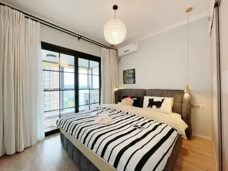 Guanjia Xidongdong Apartment (Jiangling Road) Отели в г. Цзяню