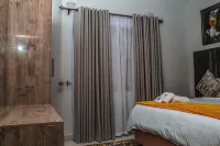 豪華兩臥自助公寓在馬斯溫戈 Great Zimbabwe University附近的飯店