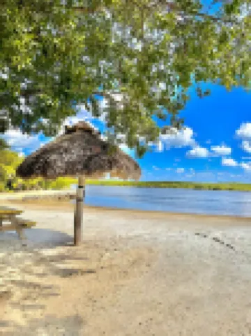 Cozy Waterfront Retreat w/ Private Boat Dock + Tiki