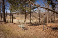 Gracious living. Swing bed with golf course view. Back 40 bike trail access.