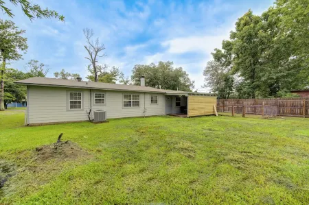 Indoor fireplace with patio and pool table