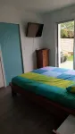 Large single-storey apartment with garden near beach