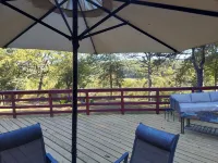 Rock Inn Retreat: E Faye Jones Style Home.  Rock Walls in All Bathrooms!