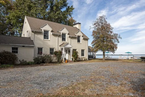 New! Gorgeous Waterfront Estate with Saltwater Pool, Beach and Dock