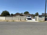 This is a 4 bed room house with 2 bathroom. Parking space. security cameras .