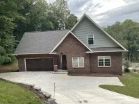 Lakefront Custom Home /w Private Dock on Cove.  Finished Basement.  2 Kitchens