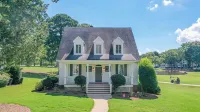 Lakefront cottage 9th green of Reynolds Lake Oconee Great Waters golf course