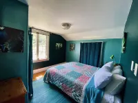 SHABBY CHIC WATERFRONT RETREAT is a relaxing, serene low bank waterfront home