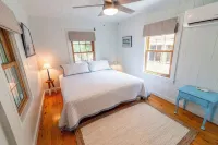 Classic Pawleys. Just Renovated. Long, breezy porches. Steps to beach and creek.