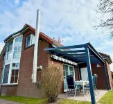 Newly furnished holiday home near the dike well suited for families with WiFi