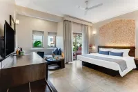 Whispering Palms Beach Resort Отели в г. Кандолим