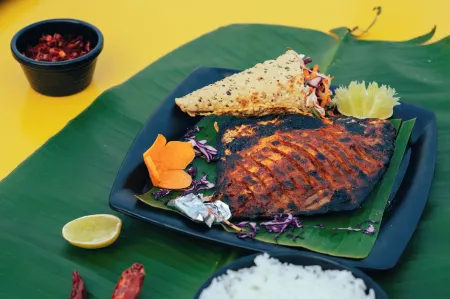 Poojaris Niranthara Kabini Отели рядом с достопримечательностью «Намдролинг Монастери»